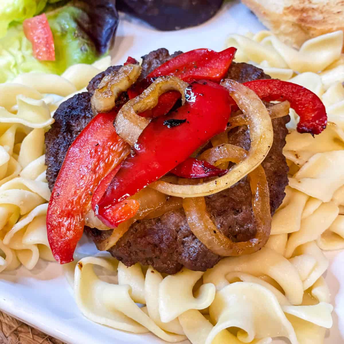 Bell peppered patties ready on a white plate