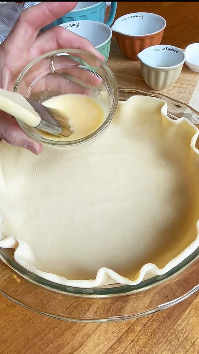 Blackberry Pie Step 2 add egg wash to bottom pie crust to prevent it being soggy