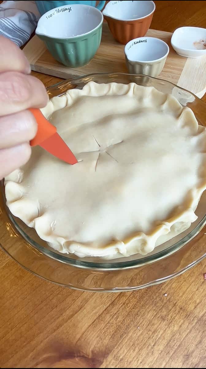 Blackberry Pie Step 4 Add top pie crust. Slit about 5 times, brush with an egg wash and sprinkle with sugar.