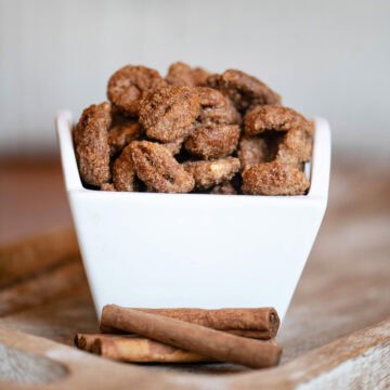 Close-up of cinnamon sugar pecans showing crisp texture and coating