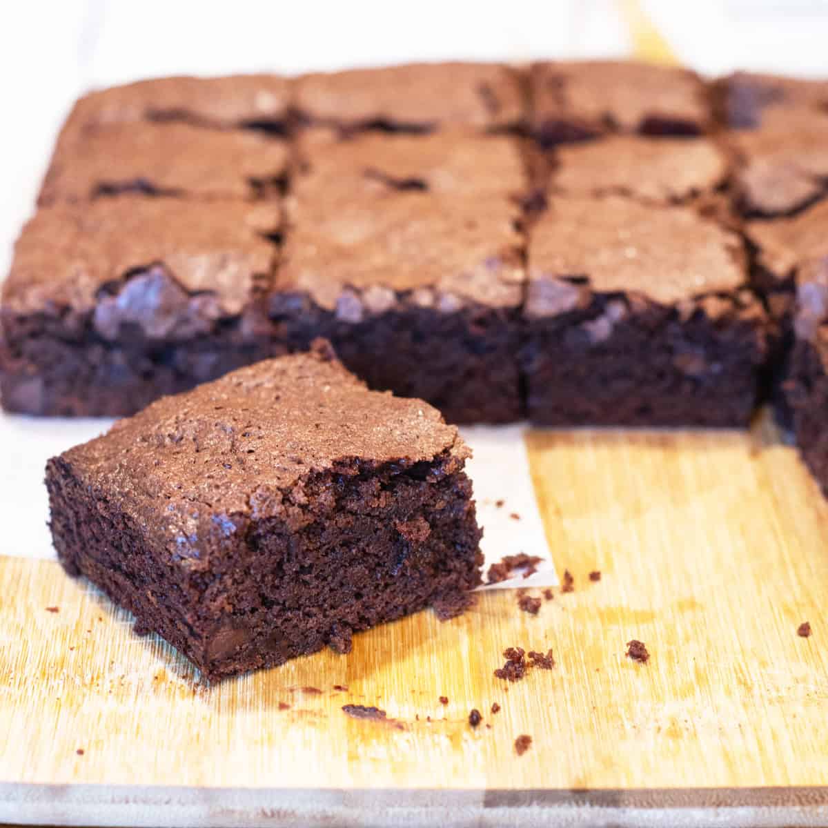 Freshly baked deep dish brownies sliced and ready to serve
