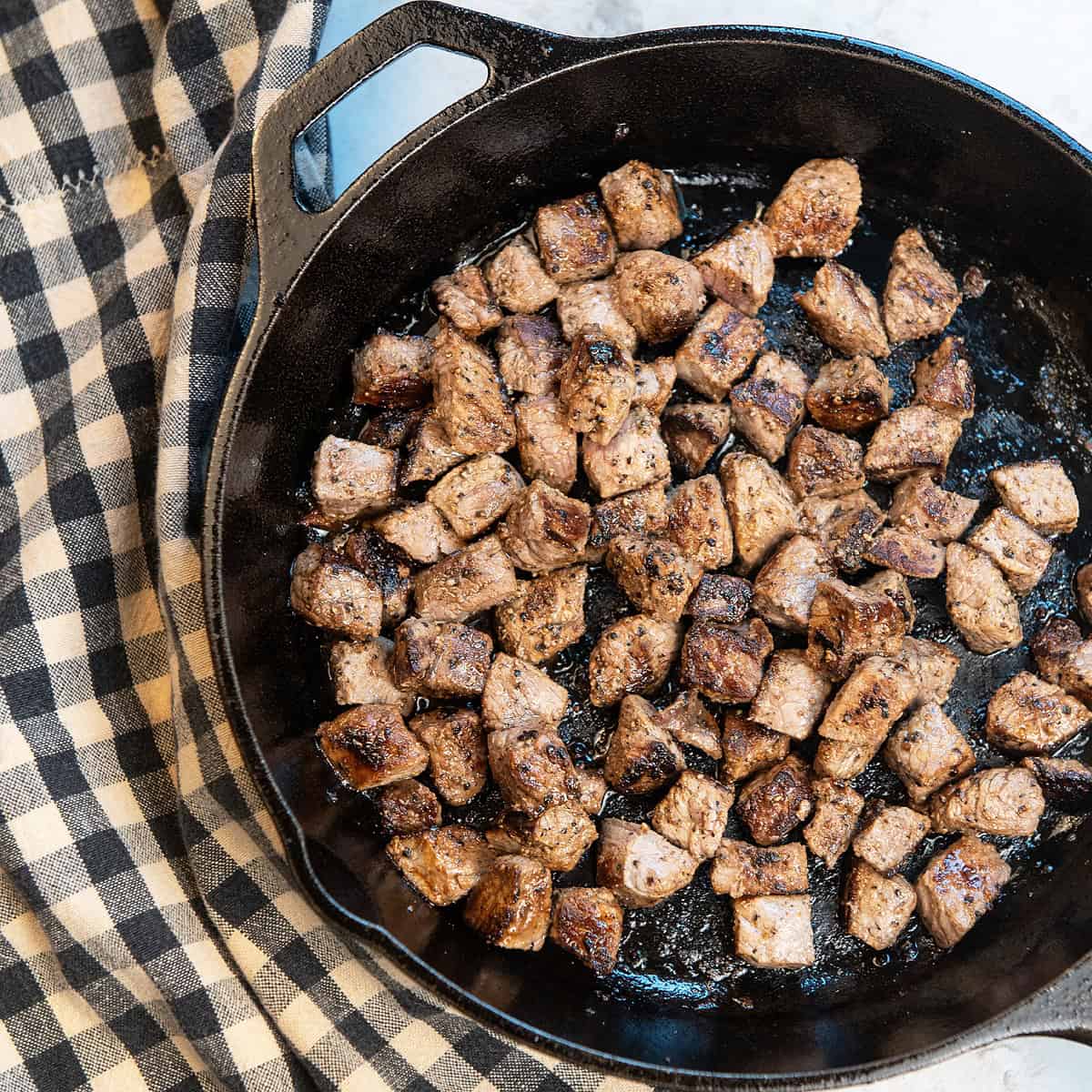 Flavorful Steak Bites just cooked in cast iron skillet