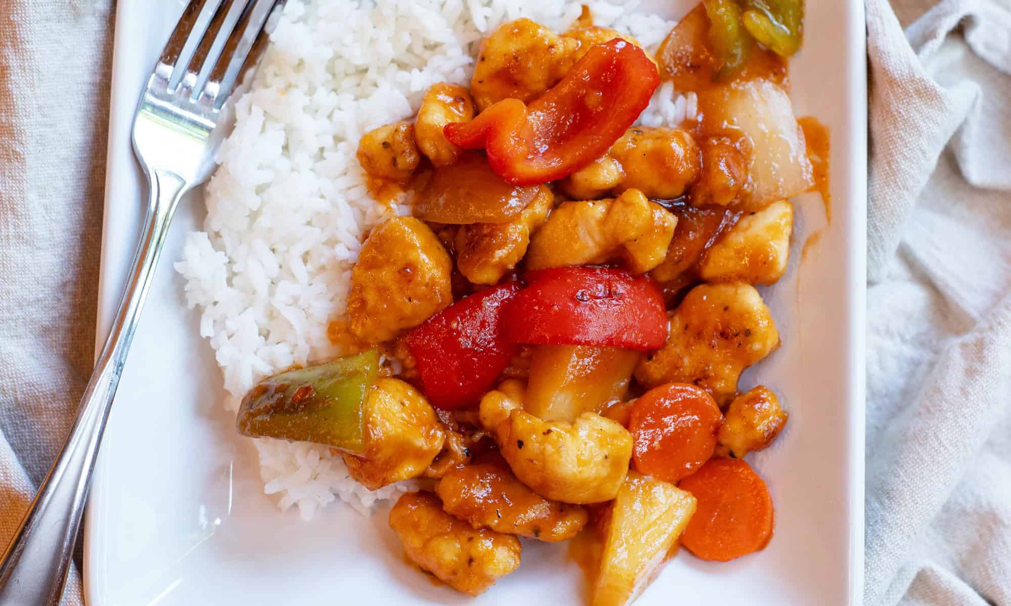 Sweet and Sour Chicken On white plate round up size