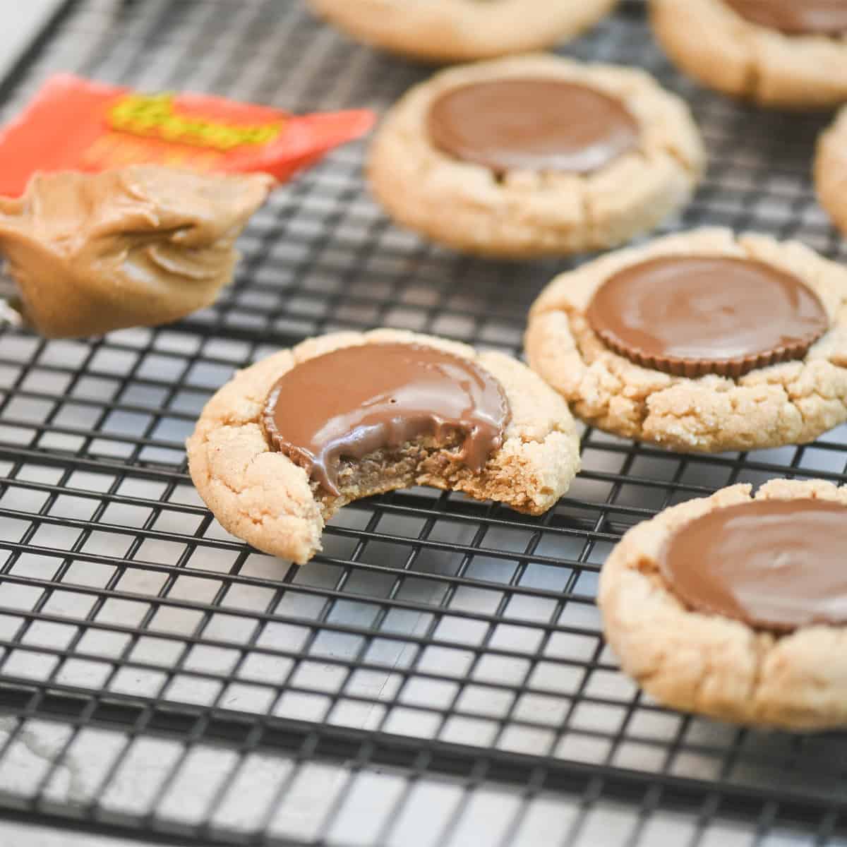 Side view close-up of a Reese’s Thins cookie showing its thick, soft texture.