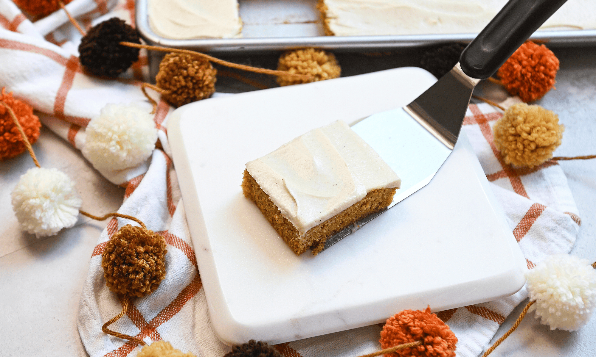 Pumpkin Sheet Cake with Cinnamon Cream Cheese Frosting ready to serve
