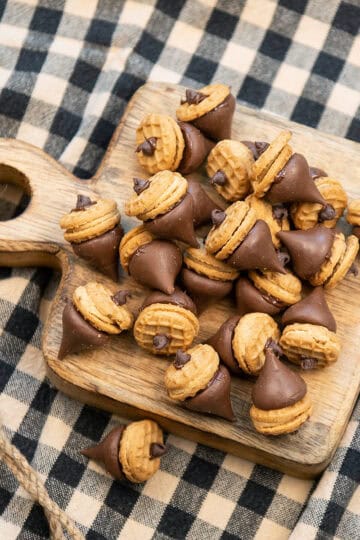 Overhead view of fall acorn treats arranged neatly on a wooden board.