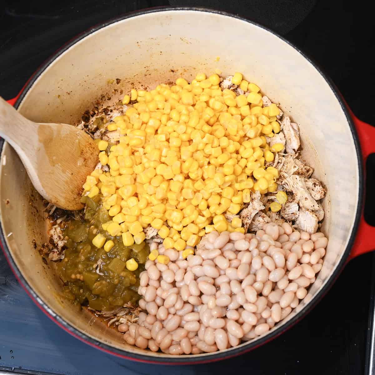 Chicken Chile Soup Step 4 Adding corn, chiles and navy beans