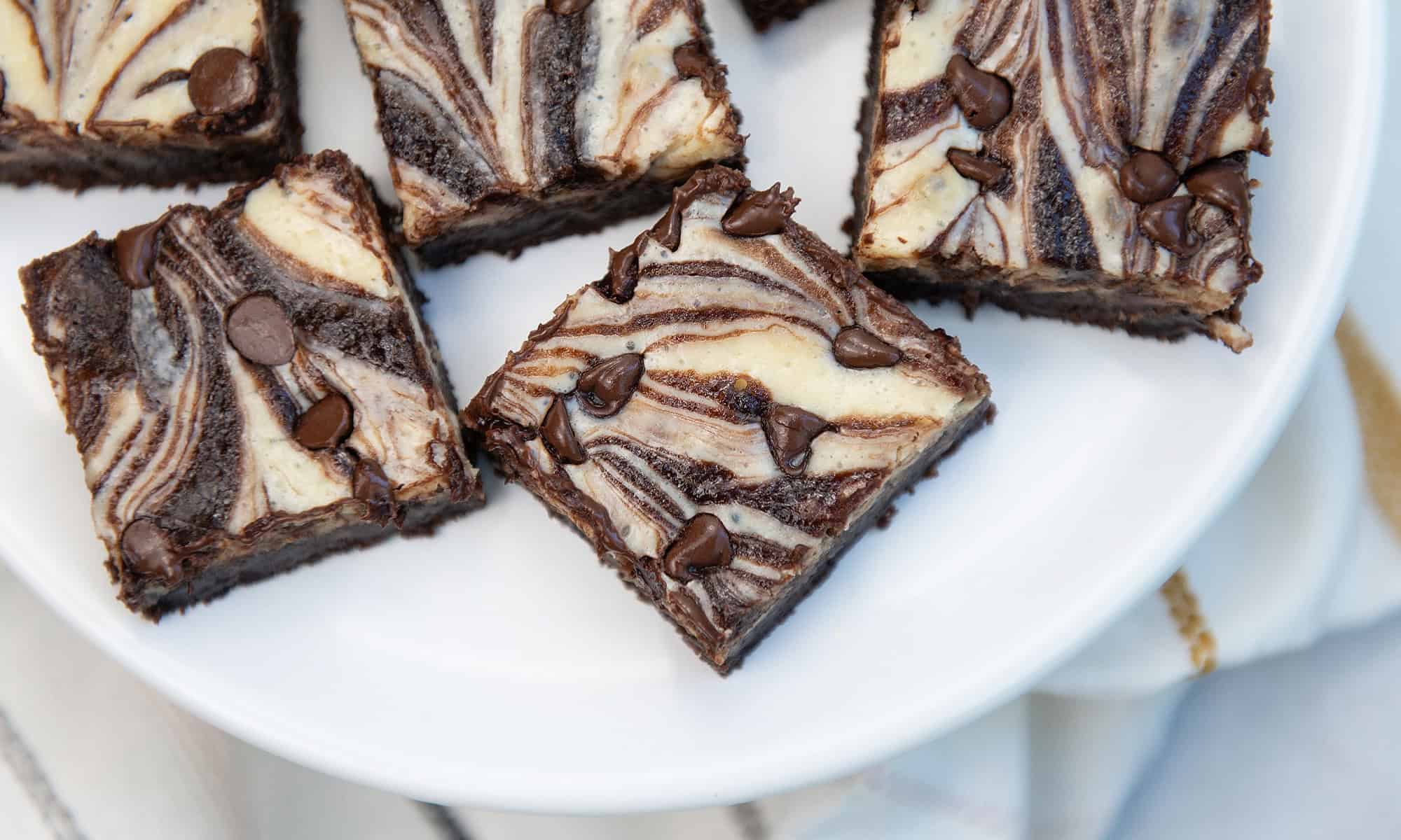 Marbled brownies cut into squares with a perfect swirl