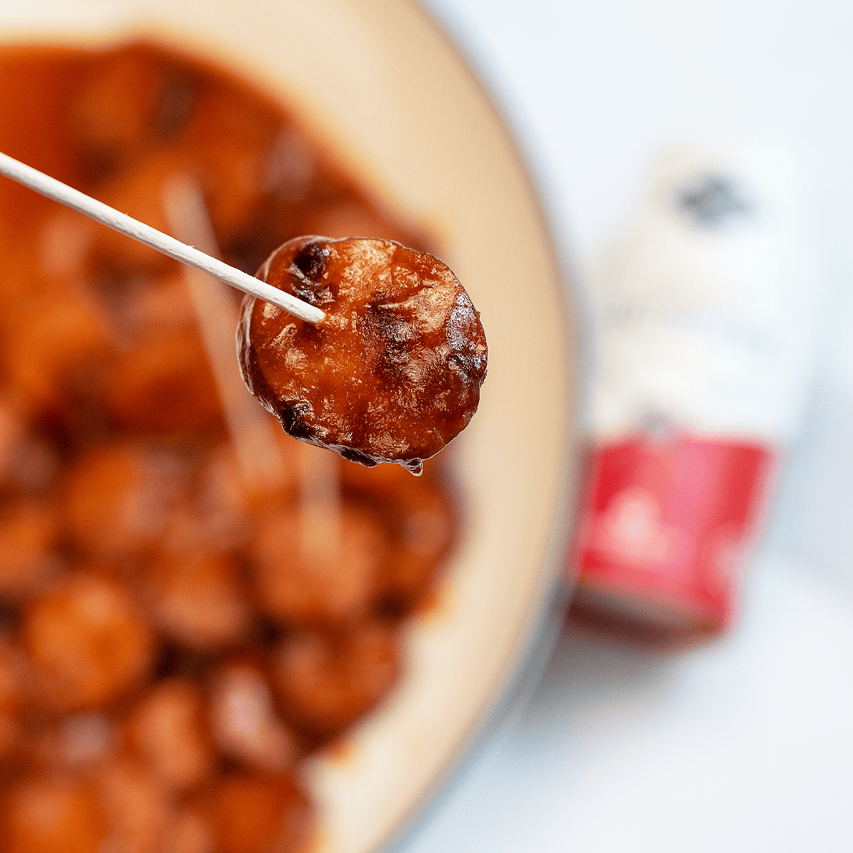 Close up of BBQ Sausage Bite on a toothpick