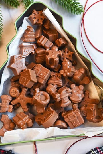 Chocolate Peanut Butter Meltaways in a christmas tree tin